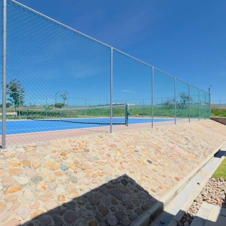 Mamposteria de piedra y canalizacion pluvial en cancha deportiva Ciudad Maderas Leon terreno en venta Huizache Torresa Inmobiliaria