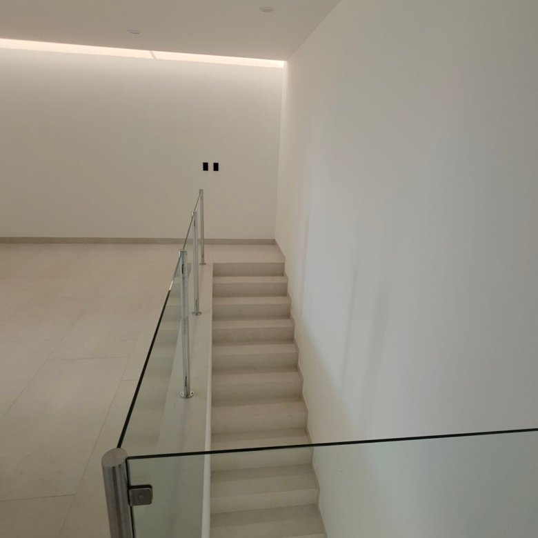 Cubo de escaleras y barandal en casa en venta Mayorca Residencial León